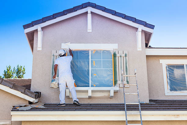 What is the importance of prepping surfaces before house painting in Overland Park?